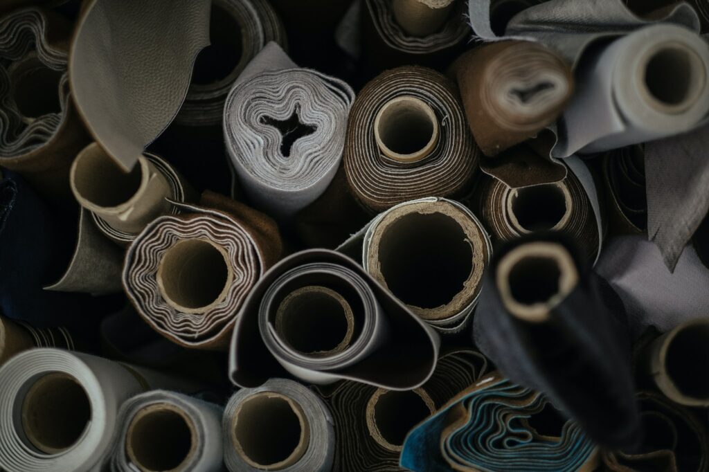 Closeup shot of rolls of various fabrics